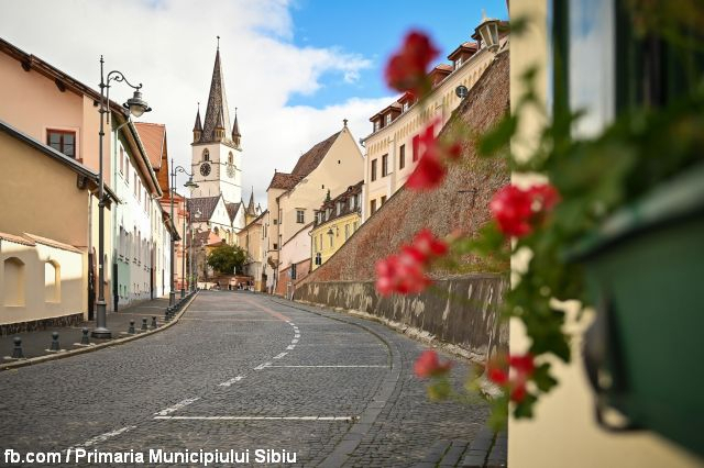 view of a typical street in the center of romanian city sibiu